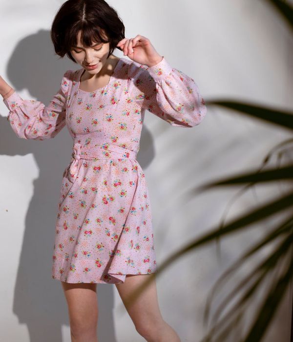 Person moving smoothly in a dark studio setting